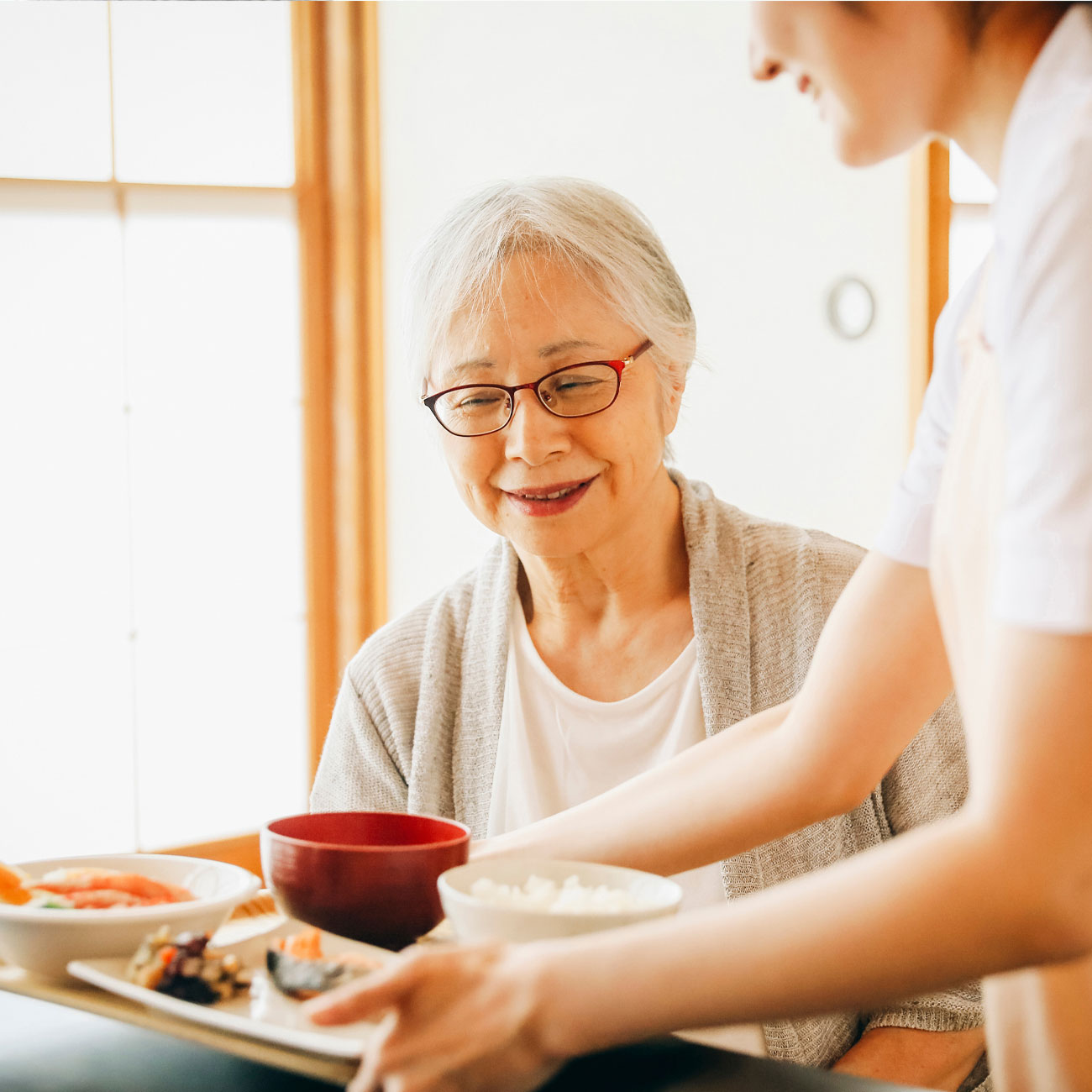 Caregiver providing support in a client's home.